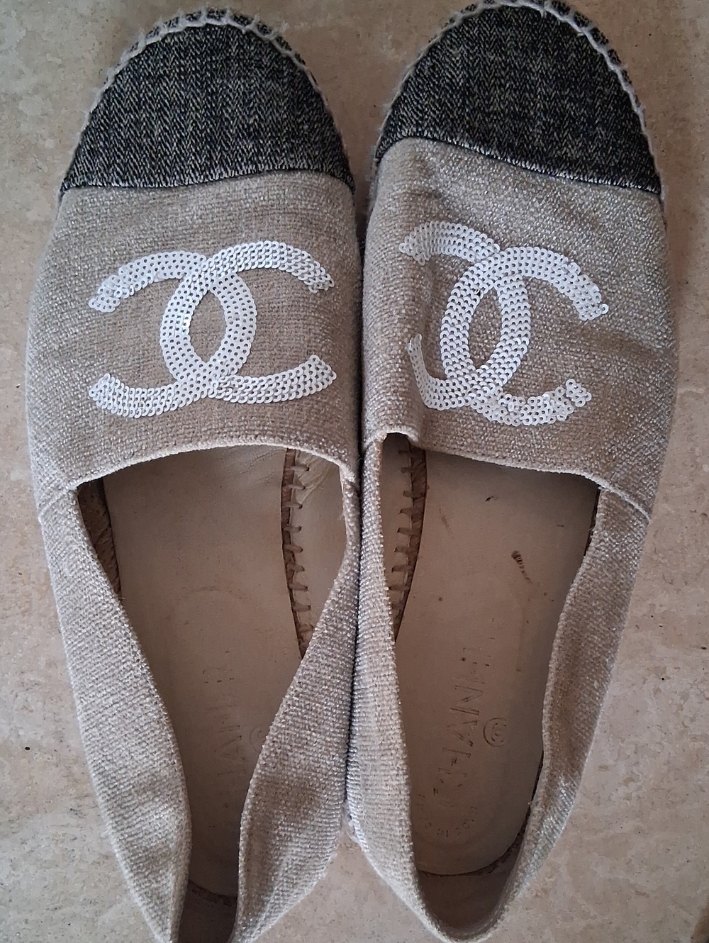 CHANEL Beige Espadrilles with White Sequin CC Logo and Black Toe.